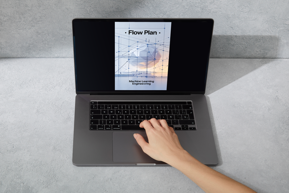 A gray laptop sits on a light gray textured surface, displaying a digital course cover titled 'Flow Plan - Machine Learning Engineering' on its screen. A person's hand is resting on the trackpad, ready to navigate the interface.